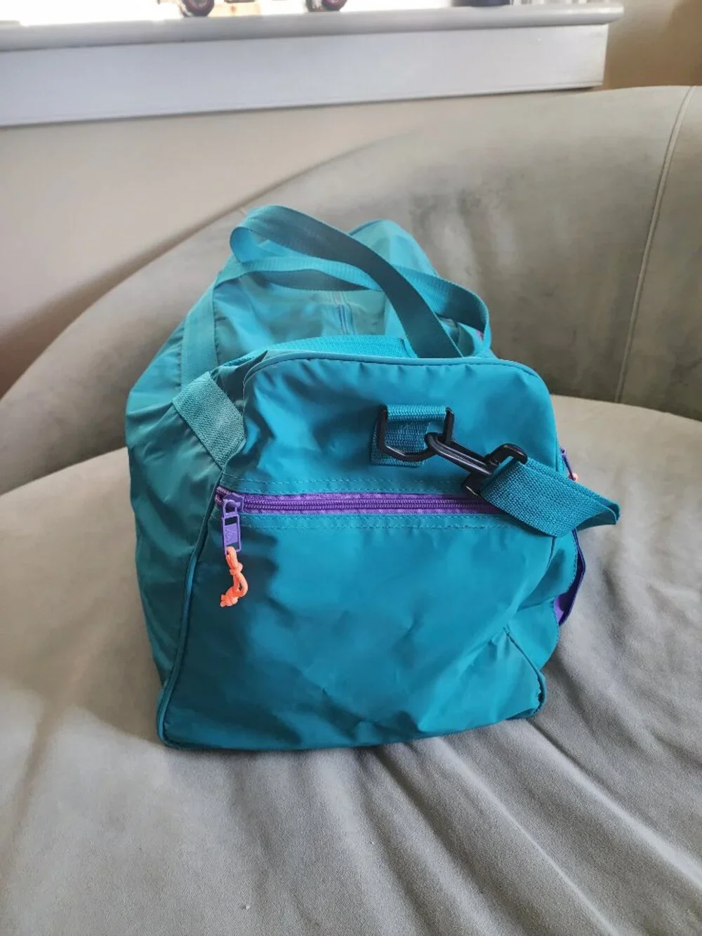 Vintage style Dunlop sports duffel bag in retro teal and purple color